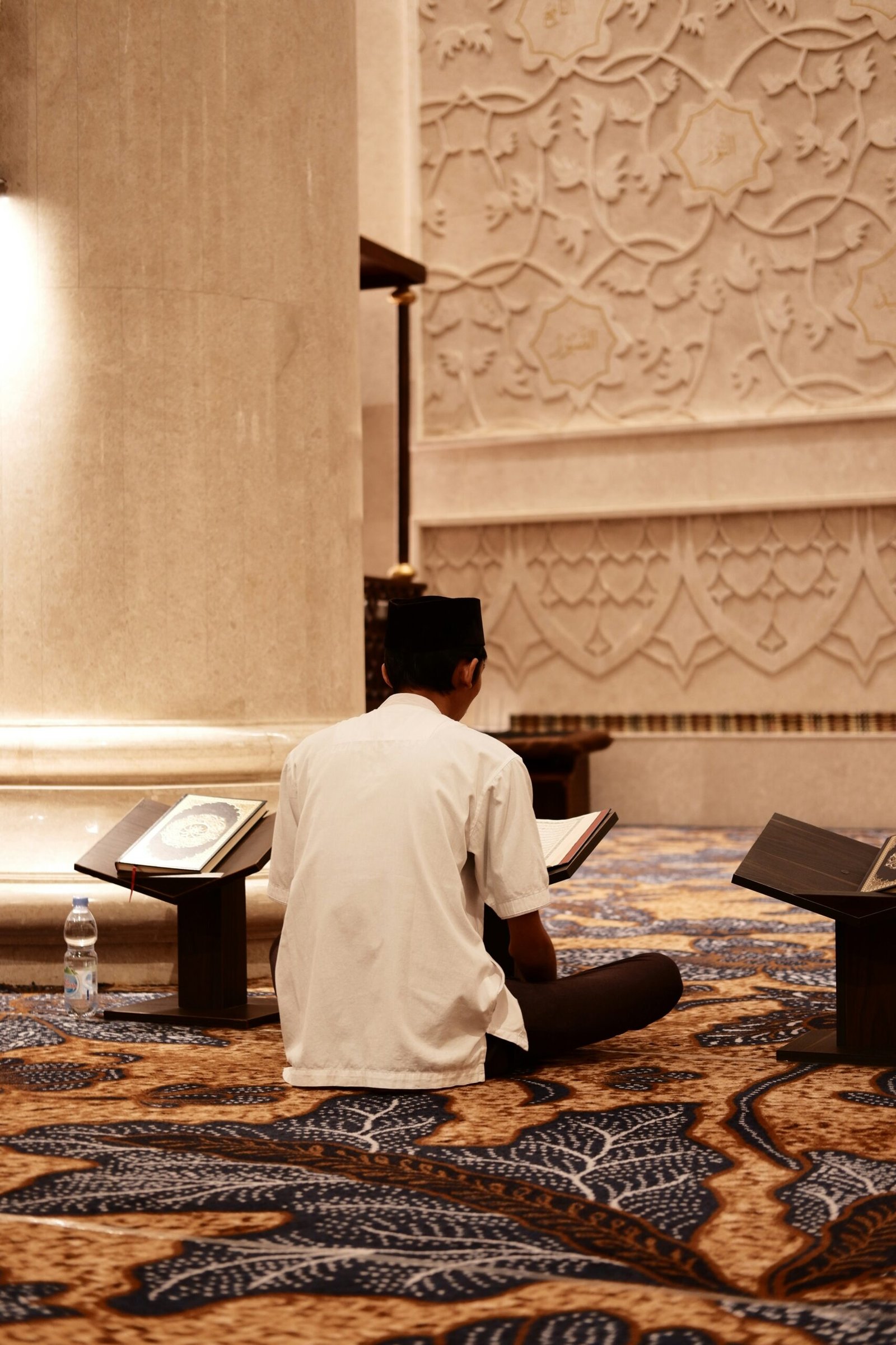 A Guide to Praying Correctly: Understanding the Essentials 1 a man sitting on the floor reading a book